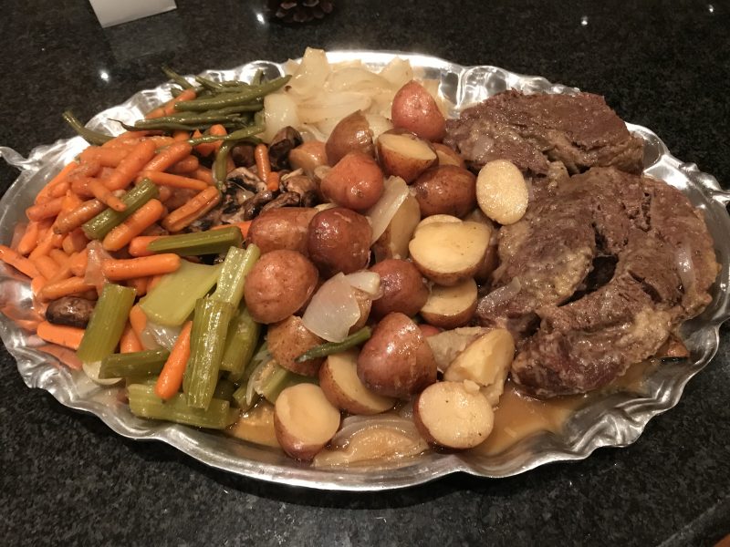 Slow-Cooked Pot Roast with Carrots, Potatoes, Mushrooms, and Gravy